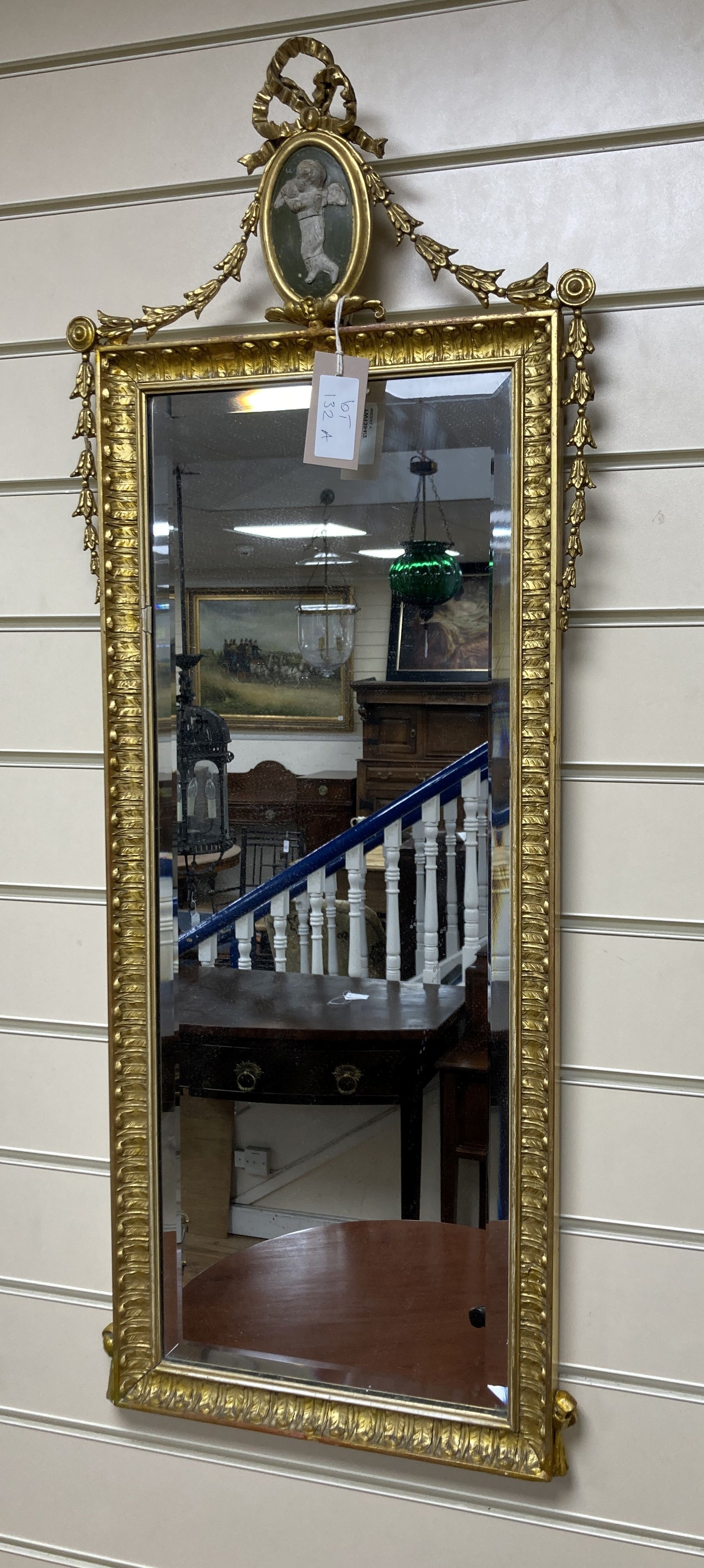 A 19th century giltwood and gesso rectangular chimney glass with faux jasperware pediment, width 44cm, height 93cm